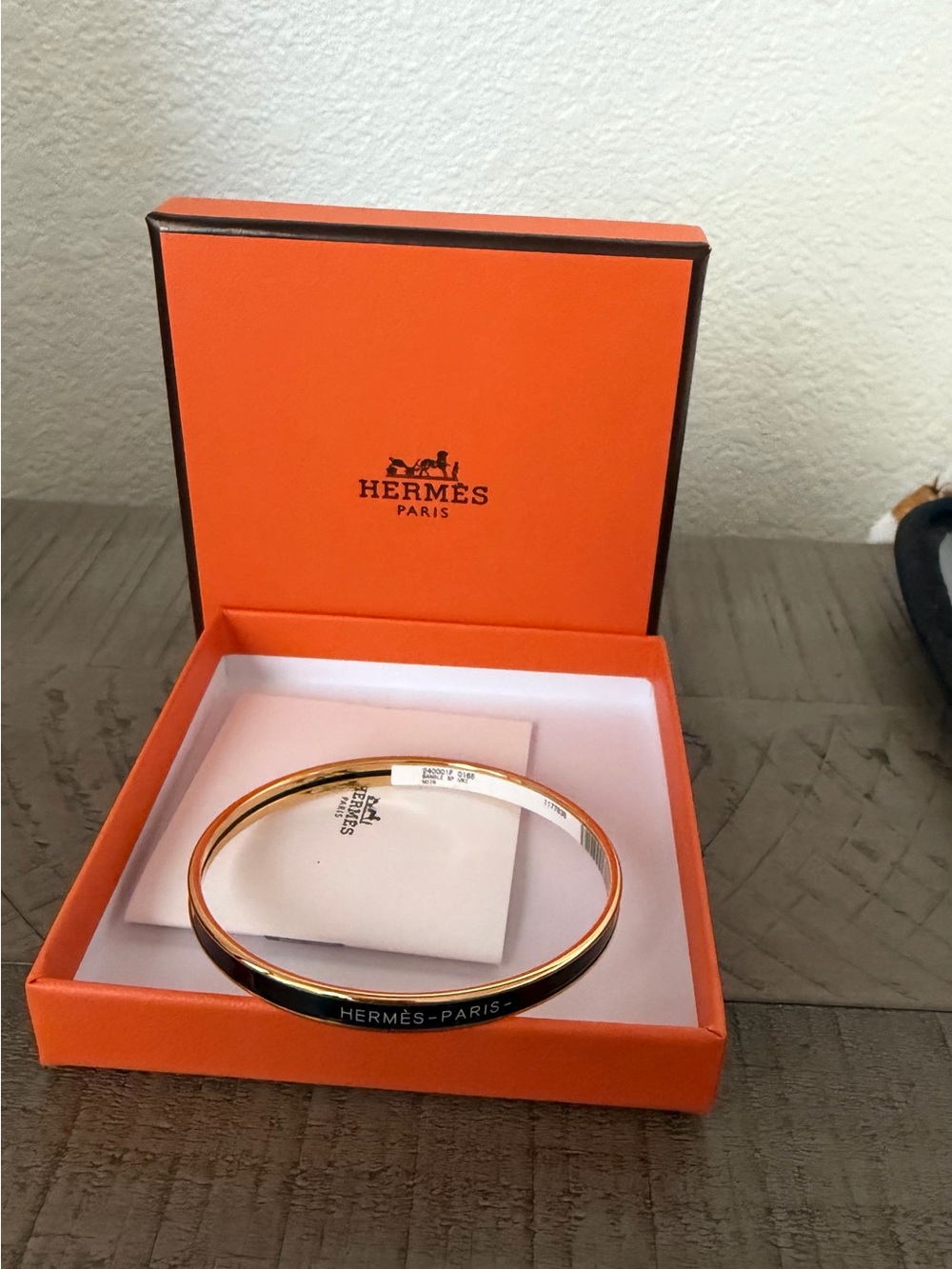 Hermes Gold and Black Uni Bangle